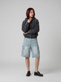 DAXUEN Light blue denim cargo shorts with multiple pockets — model photo