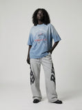 DAXUEN Faded blue oversized graphic t-shirt — model photo