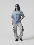 DAXUEN Faded blue oversized graphic t-shirt — model photo