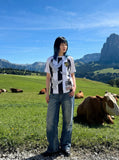 DAXUEN faded medium-dark blue wide-leg denim pants — model photo