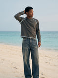 DAXUEN faded medium-dark blue wide-leg denim pants — model photo