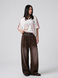 DAXUEN faded brown straight-leg casual pants with plaid waistband — model photo