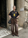 DAXUEN faded brown straight-leg casual pants with plaid waistband — model photo