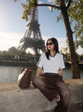 DAXUEN faded brown straight-leg casual pants with plaid waistband — model photo