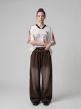 DAXUEN faded brown straight-leg casual pants with plaid waistband — model photo