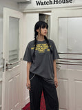 DAXUEN faded dark charcoal vintage text graphic t-shirt — model photo