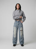 DAXUEN Faded distressed wide-leg denim jeans — model photo