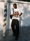 DAXUEN white oversized faded 3x3 grid graphic t-shirt — model photo