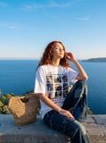 DAXUEN white oversized faded 3x3 grid graphic t-shirt — model photo