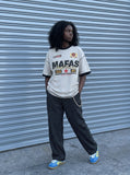 DAXUEN light grey oversized faded-checkered-flag graphic t-shirt — model photo