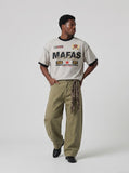 DAXUEN light grey oversized faded-checkered-flag graphic t-shirt — model photo