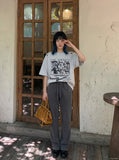 DAXUEN Faded graphic T-shirt with headshot collage print — model photo