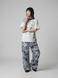 DAXUEN white faded grey wash graphic t-shirt — model photo