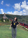 DAXUEN washed grey wide-leg cargo pants with flap pockets — model photo