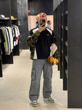 DAXUEN washed grey wide-leg cargo pants with flap pockets — model photo