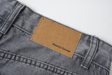 DAXUEN faded grey wide-leg jeans with metallic grommets