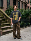 DAXUEN faded charcoal oversized grid graphic tee — model photo