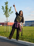 DAXUEN faded charcoal oversized grid graphic tee — model photo