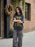 DAXUEN faded charcoal oversized grid graphic tee — model photo