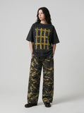 DAXUEN faded charcoal oversized grid graphic tee — model photo
