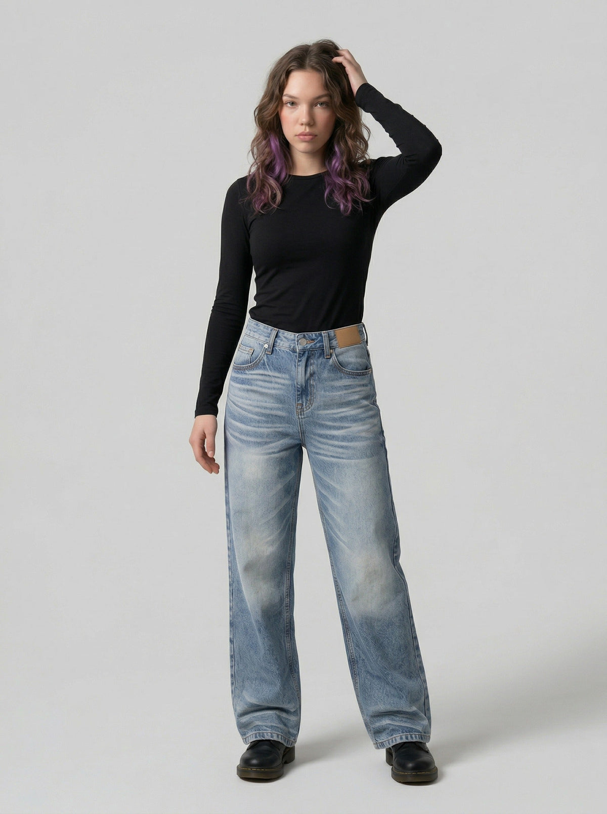 DAXUEN Faded high-waisted wide-leg denim jeans — model photo