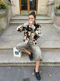 DAXUEN Faded leopard print wide-leg culottes — model photo