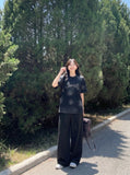 DAXUEN Faded crew neck t-shirt with 'MENTALITY' embroidery — model photo