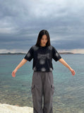 DAXUEN Faded crew neck t-shirt with 'MENTALITY' embroidery — model photo