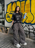 DAXUEN Faded crew neck t-shirt with 'MENTALITY' embroidery — model photo
