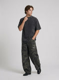 DAXUEN Faded olive green and charcoal grey t-shirt with ribbed texture — model photo