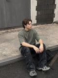 DAXUEN Faded olive green and charcoal grey t-shirt with ribbed texture — model photo
