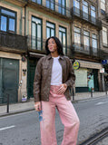 DAXUEN faded pink wide-leg pants with pockets — model photo