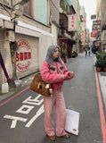 DAXUEN faded pink wide-leg pants with pockets — model photo