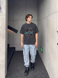 DAXUEN faded oversized pixelated graphic tee — model photo