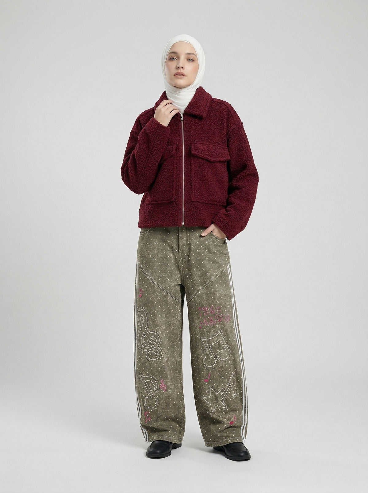 DAXUEN Faded polka dot wide leg pants with musical embroidery — model photo