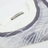 DAXUEN white T-shirt with faded portrait graphic and scribbles