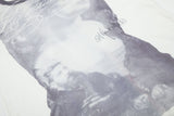 DAXUEN white T-shirt with faded portrait graphic and scribbles