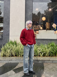 DAXUEN faded stone-wash distressed wide-leg jeans — model photo
