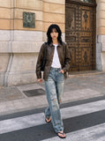 DAXUEN faded stone-wash distressed wide-leg jeans — model photo