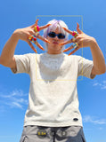 DAXUEN Faded text graphic short-sleeved T-shirt — model photo