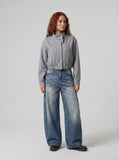 DAXUEN Pair of loose-fit wide-leg denim jeans in medium blue wash — model photo