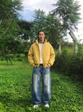 DAXUEN Pair of loose-fit wide-leg denim jeans in medium blue wash — model photo