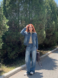 DAXUEN Pair of loose-fit wide-leg denim jeans in medium blue wash — model photo