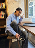 DAXUEN Faded wide-leg denim trousers with contrasting stitching — model photo