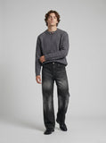 DAXUEN Faded wide-leg jeans in washed denim finishes — model photo