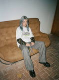 DAXUEN Faux layered long sleeve t-shirt with camouflage sleeves — model photo