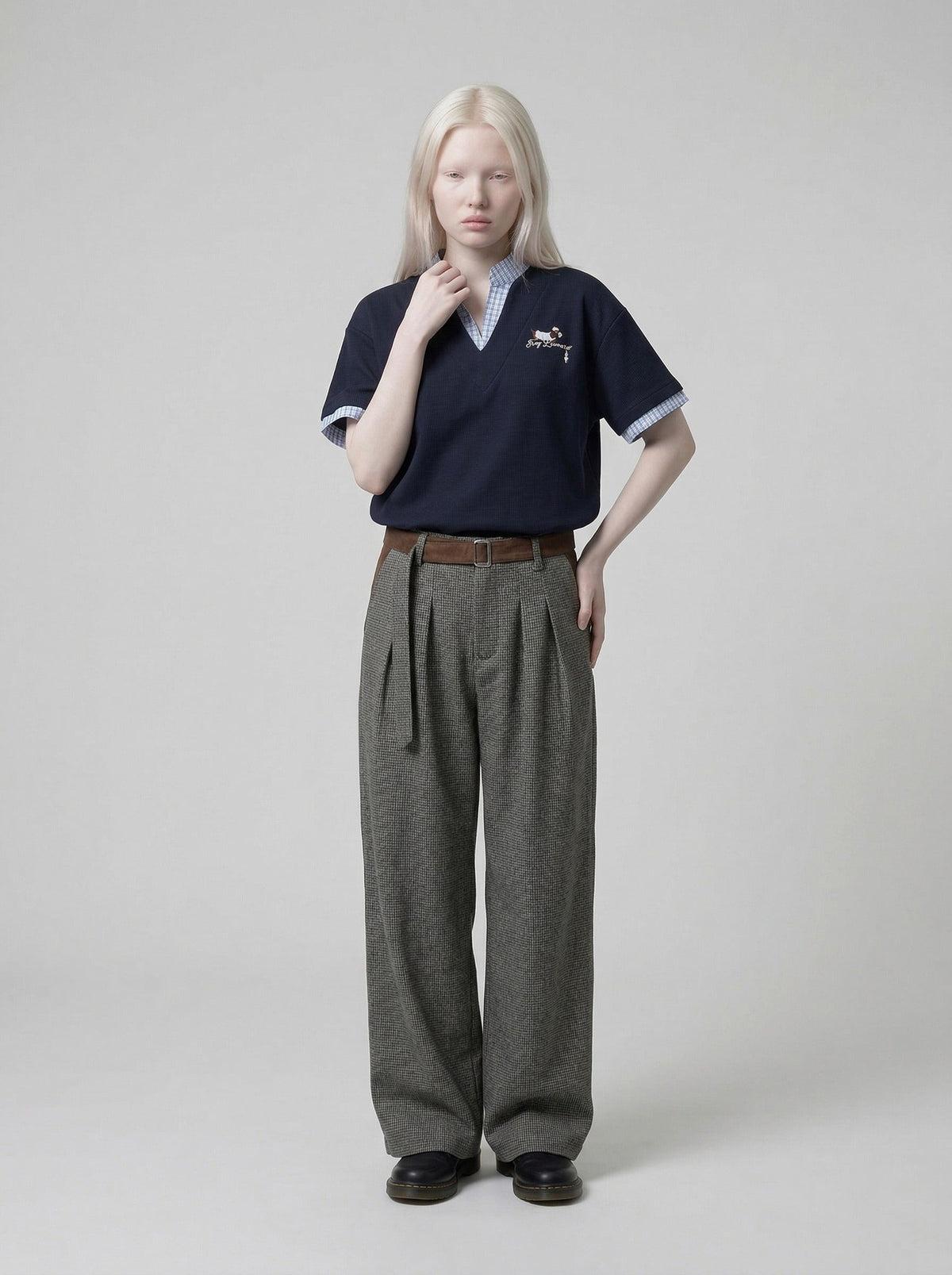 DAXUEN Faux-layered short-sleeved T-shirt with cartoon dog embroidery — model photo