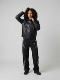 DAXUEN Men's relaxed-fit faux leather jacket — model photo