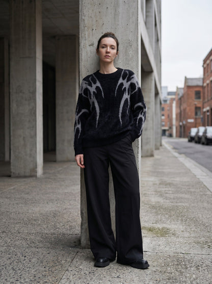 DAXUEN Faux mink texture crew neck sweater with abstract patterns — model photo