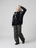 DAXUEN Faux mink texture crew neck sweater with abstract patterns — model photo